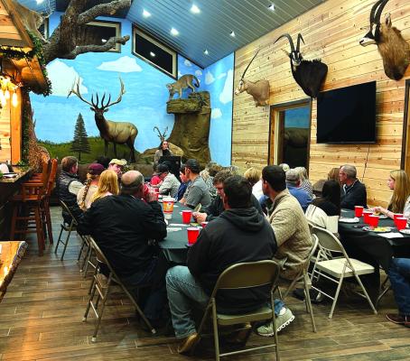 Maeley Herring Stroupe, Retention Specialist at TTU Davis College of Ag., shared about Leadership opportunities through Texas Farm Bureau at the Agriculture Leadership Dinner held at V-Tex Whitetail and Elk Ranch. Archer County 4-H officers and members as well as Windthorst FFA members were in attendance. Photo/Vanessa Parkey