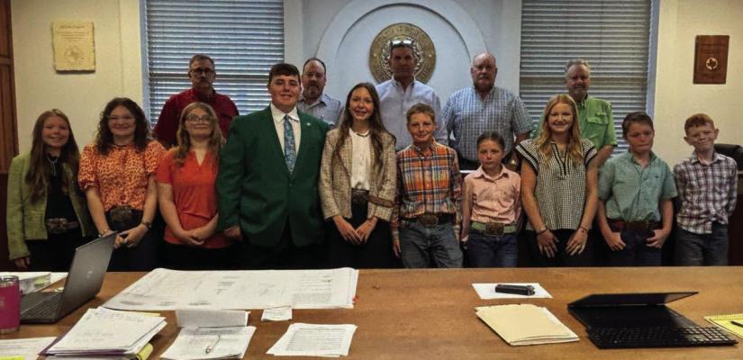The Archer County Commissioner's Court poses for a photo with members of Archer County 4-H following the proclamation of National 4-H week in Archer County from Oct. 4-10. Courtesy photo