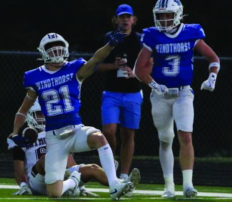 Trojan defensive back Daxton Anderson celebrates after his interception against the Seymour Panthers on Friday, Sept. 26. Courtesy photo/Jamie Anderle