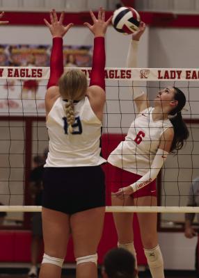 Lady Eagles Outside Hitter Camdyn Stapleton looks for a kill during the Lady Eagles 3-2 loss to Memorial on Tuesday, Sept. 8. Photo/Rolando Medina