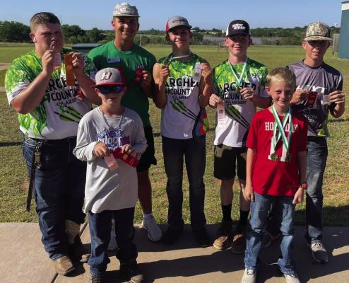 Archer County 4-H shooting sports members pose with their ribbons and medals from their placing at the 4-H District 3 Archery Contest. Courtesy photo