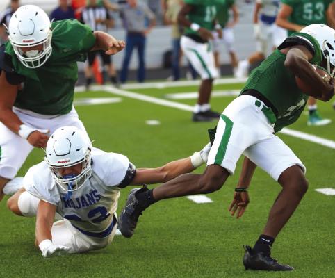Trojans, Wildcats scrimmage Alvord, Paradise