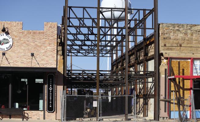 Aulds Classic Cars announced its plans for 105 East Main Street in Archer City including extra showroom space, a vintage themed movie theater room and living quarters. Photo/Landon Davis