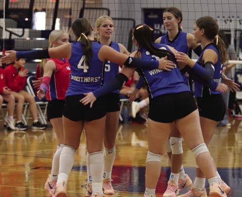 The Windthorst Trojanettes celebrate a point in their 3-0 win over Christ Academy on Friday, Sept. 4. Photo/Rolando Medina