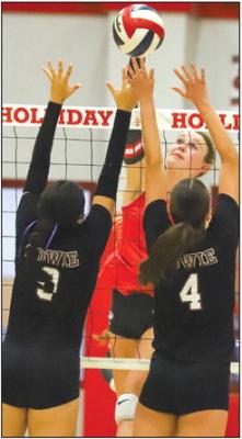 Holliday freshman Emma Ellis goes up for the tip in the first set of the Lady Eagles’ 3-0 sweep of Bowie on Fri., Sept. 22. Photo/Will Edwards