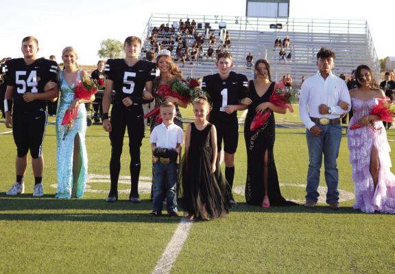 Archer City's Homecoming Court (L-R); Brody Reneau, Talynn Lowe, Landon Smith, Homecoming Queen Adelyn Harvey, Parker Hilbers, Emily Anderson, Esteban Zea Monroy, Estefani Zea Monroy. Ring Bearer was Hayes Tucker. Flower Girl was Charlie Mae Green. Photo/Jerry Phillips