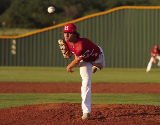 Starting pitcher Caleb White heaves a strike in Holliday’s district matchup with Jacksboro on Tuesday, April 22. Photo/Landon Davis