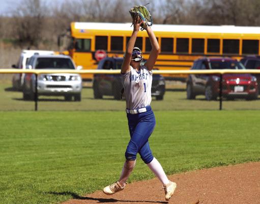 Windthorst's Karissa Fillingim catches a flyball during the Trojanettes 14-10 win over the Petrolia Lady Pirates on March 13. Photo/Landon Davis