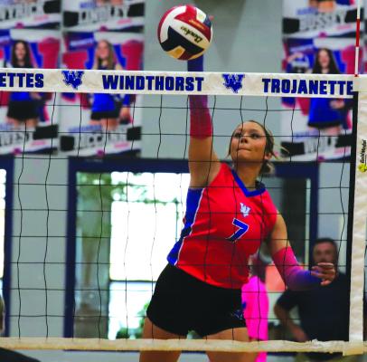 Senior Trojanette Isabel Bussey hammers down a kill in Windthorst’s 3-0 sweep over the Nocona Lady Indians on Tuesday, Oct. 8. Photo/Landon Davis