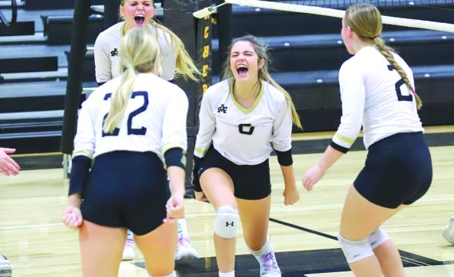 Archer City’s Brynlee Skelton celebrates a kill in the fourth set of the Lady Cats’ 3-1 win over Petrolia on Friday, Oct. 14. Photo/Will Edwards