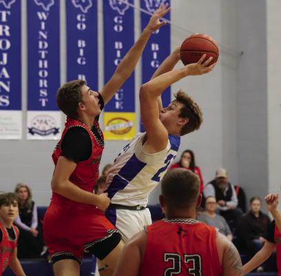 Windthorst’s Jaxon Stark was named to the all-tournament team this week after he had two games of 24 points to help the Trojans to a 3-1 record. Photo/Landon Davis