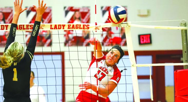 Holliday’s Addison Lindemann continued her string of matches with at least 10 kills, putting down 18 and 15 winners in the Lady Eagles’ pair of sweeps over Bowie and Henrietta. Photo/Will Edwards