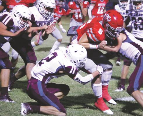 Jaxx Johnson carries the ball in the second quarter of Holliday’s 49-7 win over Callisburg on Friday. Johnson finished with 43 yards and a touchdown. Photo/Jerry Phillips