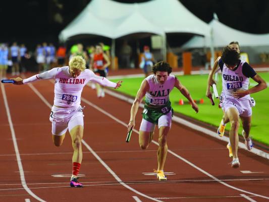 Holliday’s Braydn Hamill extends for the finish line in the 4x400 relay at the state meet on Thursday. His leg sealed the deal on the Eagles’ back-to-back track state championship. Photo/Landon Davis
