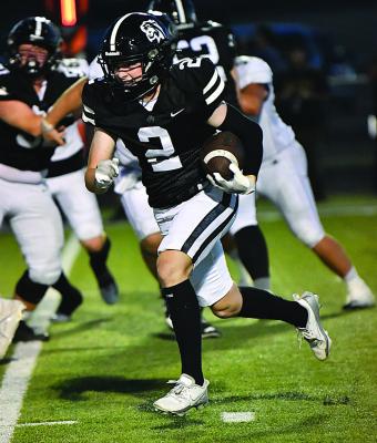 Archer City junior Gage McCord breaks loose for a run against the Alvord Bulldogs on Friday, Sept. 12. Courtesy photo/Donna Williams