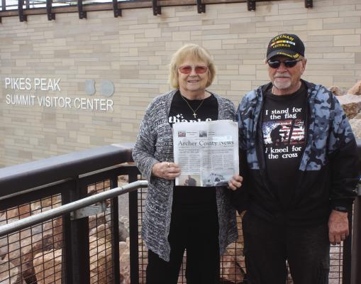 Rick and Mary Hutchings of Archer County recently took their Archer County News 14,000 feet above sea level to the top of Pikes Peak. Visibility was not so great that day, so having something to read helped pass the time while they waited for the clouds to clear. Courtesy photo