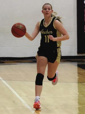 Lady Cat Junior Shianne Bracey dribbles the ball down the court against Lindsay in the Petrolia Classic on Tuesday. Bracey finished the game with five points. Photo/Landon Davis