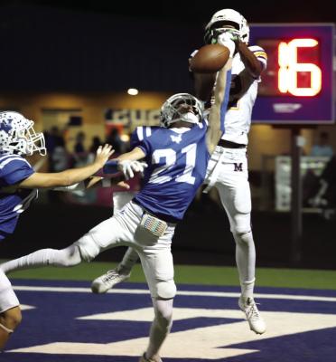 Trojan defensive back Daxton Anderson deflects a Mogul pass in the endzone in Windthorst’s 62-0 thumping over Munday on Friday, Oct. 4. Photo Landon Davis