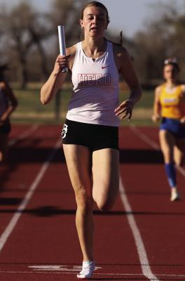 Lady Eagle 4x100 anchor leg Emma Ellis finishes through the line with room to spare at the Jacksboro High School Invitational track meet on Thursday, March 19. Photo/Landon Davis