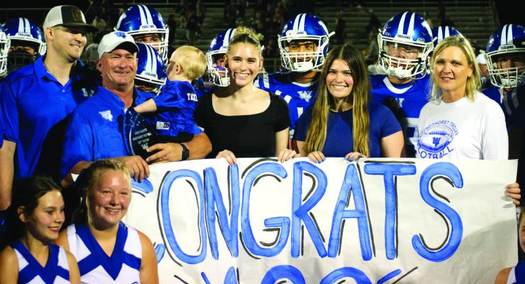 Windthorst Head Coach Chris Tackett was recognized for his 100th win at the helm of the Trojans following the Trojans 46-21 win over Henrietta on Friday, Aug. 30. Photo/Nathan Lawson