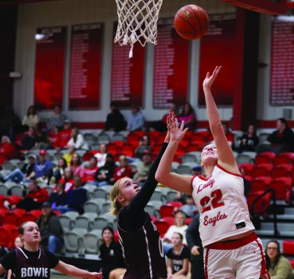 Lady Eagle post Jordan Peters shoots a layup over a Lady Rabbit defender on Tuesday, Feb. 3. Photo/Landon Davis