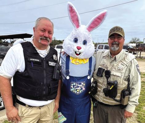 The Archer County Law Enforcement Association hosted its inaugural easter egg hunt at the Archer County Law Enforcement center on Saturday, April 9. Pictured is the Easter bunny with constable pct. 2 and a sheriff's deputy. Courtesy photo