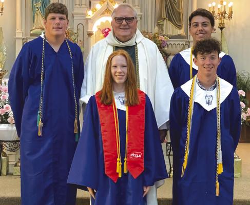 Father Michael Moloney (center) stands with St. Mary's Better Balanced Person scholarship awardees Larson Vieth, Emma Herring, Landon McLemore and Conner Schroeder. Courtesy photo