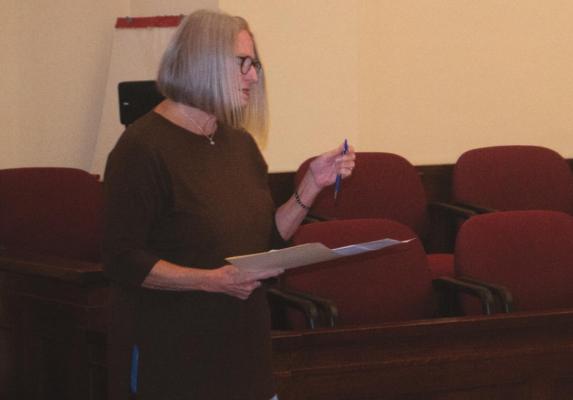 Archer County Elections Adminstrator Christie Mooney speaks to the commissioners court about ordering an election. Photo/Nathan Lawson