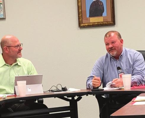 Holliday ISD superintendent Cody Carroll (right) talks about the facilities committees recommendation on facility udpates at the school board meeting Monday, March 21. Also pictured is board president Blake Jurecek. Photo/Nathan Lawson