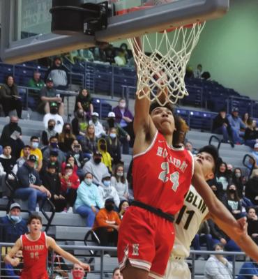 Holliday’s Nathan Williams dunks the ball in the second half of the Eagles’ 85-82 overtime loss to Dublin in bi-district on Saturday, Feb. 20, in Weatherford. Photo/Will Edwards
