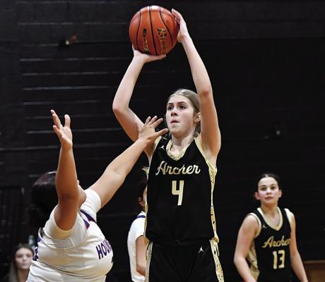 Archer City freshman Lyla Nichols shoots a midrange jump shot over a defender in the Double Mountain Classic basketball tournament in Aspermont on Friday, Dec. 12. Courtesy photo/Donna Williams