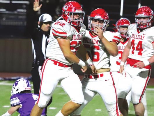 Holliday’s Parker Jones celebrates after a fourth down stop on defense in the Eagles 63-12 bi-district win over Jacksboro on Thursday, Nov. 11 in Graham. Photo /Will Edwards