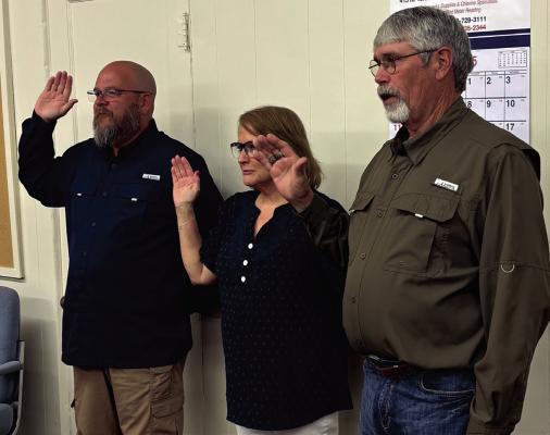 Greg Anderson, Leslie Hash and Billy Burks were sworn into another term on the Archer City Council on Thursday, May 22. Photo/Nathan Lawson