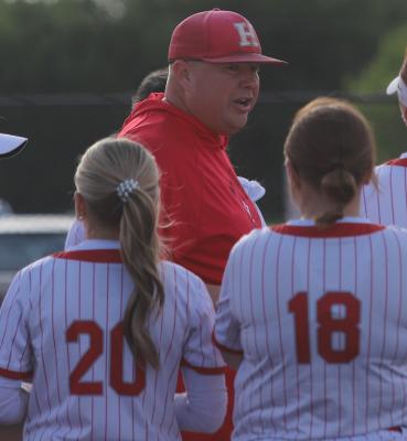 Coach Billy Arbogast speaks with his Lady Eagles during a break in action this season. Arbogast received public support from players, parents, and community members during Monday’s Holliday ISD School Board meeting. File photo