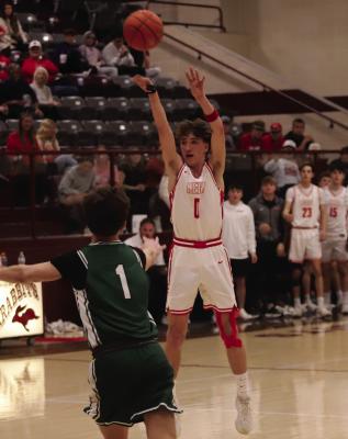 Holliday’s Jason Luke nails a deep three in the Eagles’ Bi-District-round clash with Breckenridge on Monday, Feb. 23. He finished the game with 37 points. Photo/Landon Davis