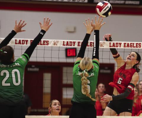 Holliday freshman Camdyn Stapleton slaps over a point during the Lady Eagles’ district match with Iowa Park on Tuesday, Oct. 14.