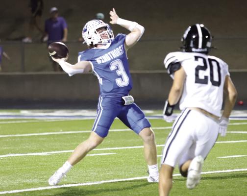 Trojan quarterback Brock Belcher looks deep down field in Windthorst’s home district game against Archer City on Friday, Oct. 10. Courtesy photo/Jim Harrison