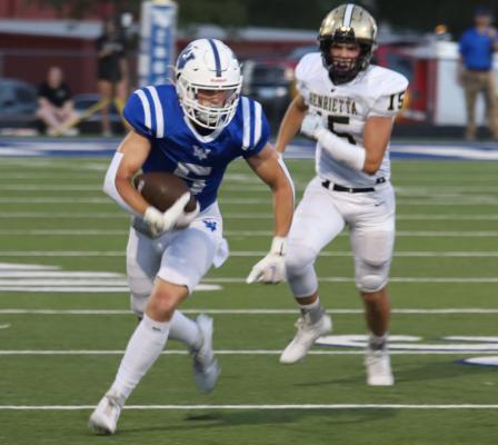 Trojans outlast Henrietta, 37-34