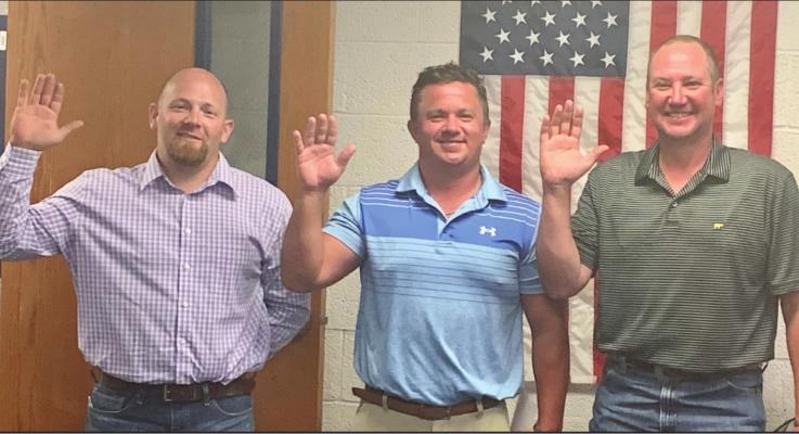 New Windthorst ISD board members (L-R) Matt Lindemann, Cody Geis and Shawn Price were sworn into office after the board canvassed the votes on Monday, May 16. Courtesy photo/WIndthorst ISD