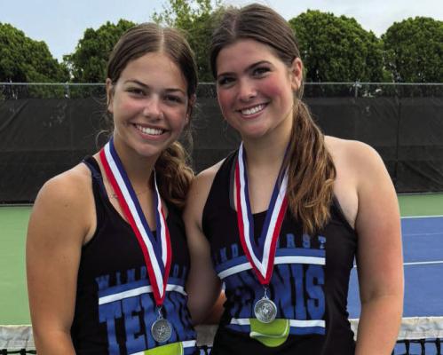 Trojanette sophomore tandem Chloe Schroeder and Heidi Tackett advanced to the Regional Tennis Tournament after placing second in the Girls’ Doubles Division at the district meet. Courtesy photo