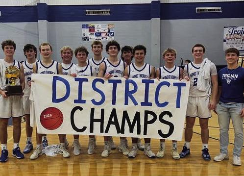 The Windthorst Trojans pose in front of their district championship banner after they secured their first district title since 2006. Courtesy photo