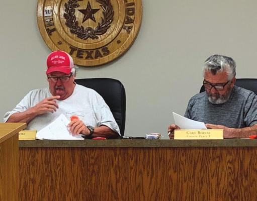 Holliday Mayor Allen Moore discusses the failed alcohol petition during the city council meeting as council member Gary Bernal listens on. Photo/Callie Lawson