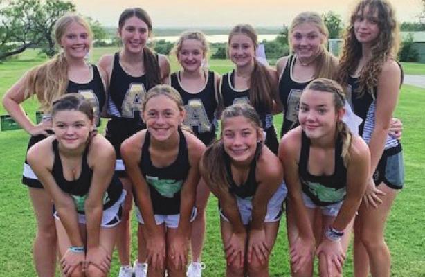 Archer City Junior High and High School Cheerleaders served as hostesses for the fundraising Glo-Ball Tournament at the Archer City Country Club last Saturday night. Front row L to R: Emily Anderson, Kaity David, Addi Canada, Shianne Bracey Back Row L to R: Jaycie Holly, Kadence Huffman, Brooke Smith, Kambri David, Abby Havens, Becca Taggert . Courtesy photo/Amy Mayo