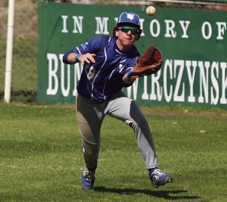 Trojan centerfielder Brock Belcher extends for a line-drive ball in the Highway 82 Classic. Photo/Landon Davis
