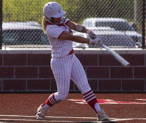 Lady Eagle pitcher Carly Duggins nails a pitch against the Vernon Lady Lions on Friday, April 11. Duggins finished the day 2-for-2 with two RBIs. Photo/Landon Davis