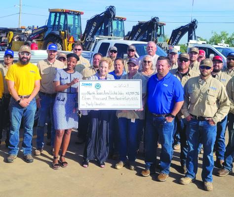 Atmos Energy present check to North Texas Area United Way