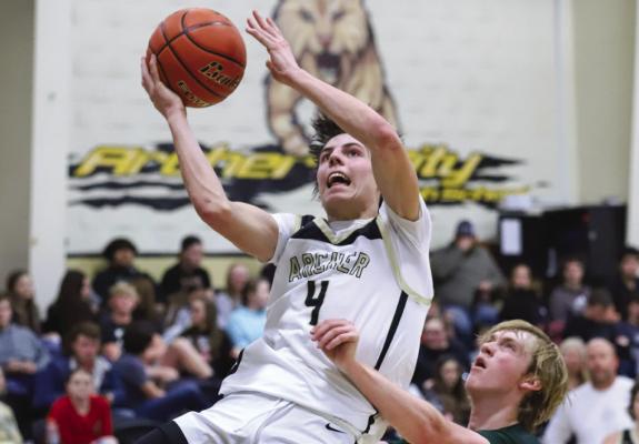Chance Warren goes up for a bucket in the Wildcats’ 80-32 win over Santo to open the Wildcat Classic on Thursday, Dec. 1. Photo/Will Edwards