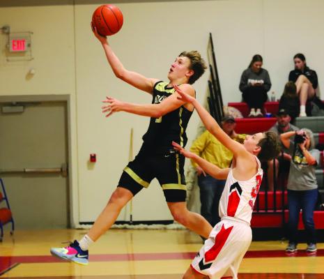 Archer City Senior Landon Smith goes up for a layup in the Wildcats 54-26 win over Midway on Tuesday, Nov. 28. Photo/Landon Davis
