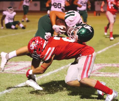 Holliday senior Austin Jones makes an open-field tackle in the Eagles’ 34-12 win over Breckenridge on Friday, Sept. 24. Photo /Will Edwards