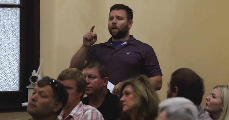 Resident Joshua Stidham asked the county to fight for its residents at the Archer County Commissioner's Court meeting on Thursday, May 21. Photo/Nathan Lawson